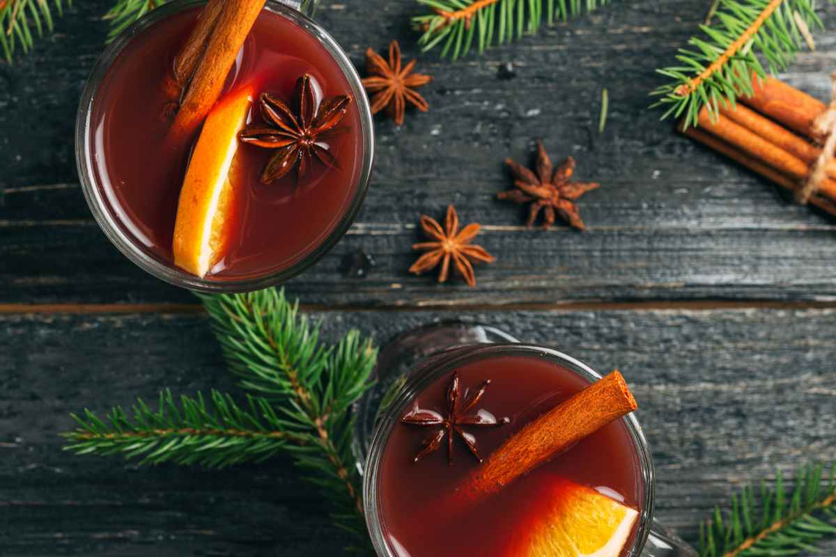 Winter wine cocktails on a wooden table